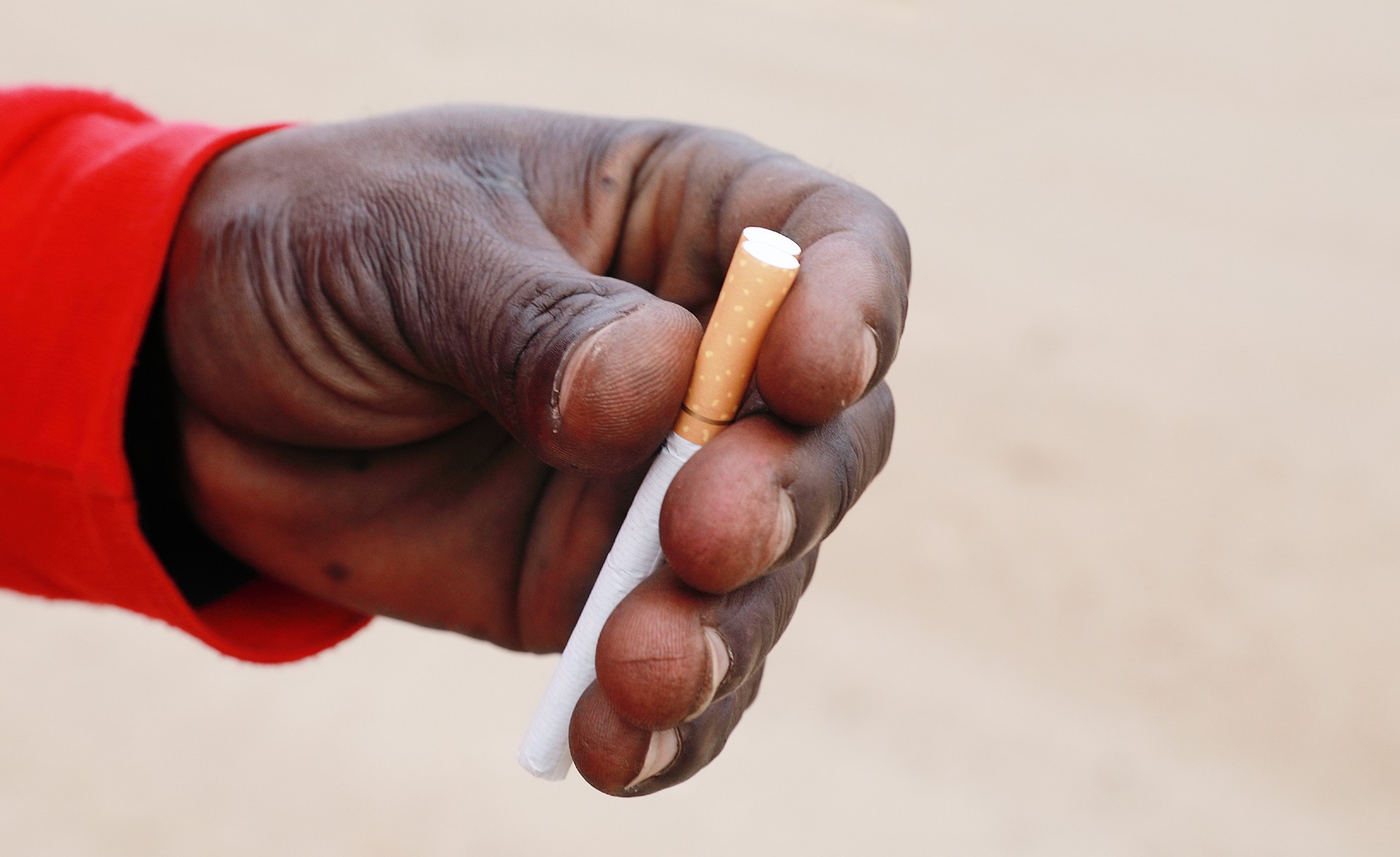 Holding cigarettes